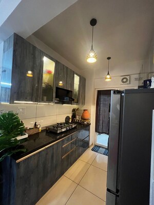 Kitchen in 2 BHK Apartment at Gulshan Botnia, Sector 144 – for Sale