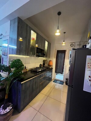 Kitchen in 2 BHK Apartment at Gulshan Botnia, Sector 144 – for Sale
