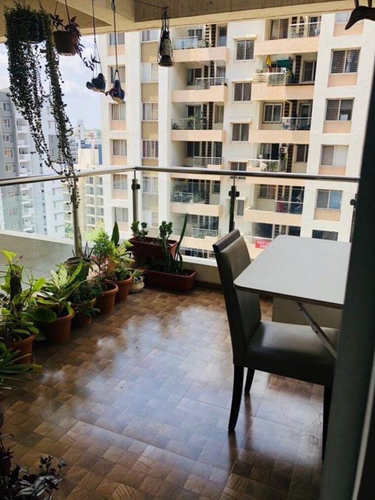 Balcony, aarohi-chs-sus 2 Bedroom 900 Sq.Ft. Apartment In Sus Pune 10395025