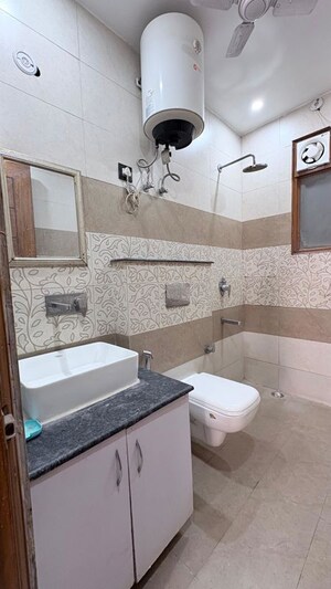 Bathroom in 3 BHK Builder Floor at Ansal Plaza Sector-23, Sector 23 – for Rent