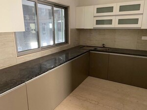 Kitchen in 4 BHK Apartment at Oberoi Realty Esquire, Goregaon East – for Sale