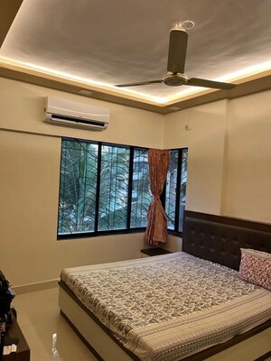 Bedroom in 2 BHK Apartment at Shree Sankalp Sidhi CHS, Kandivali East – for Rent