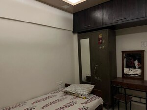 Bedroom in 2 BHK Apartment at Shree Sankalp Sidhi CHS, Kandivali East – for Rent