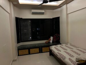 Bedroom in 2 BHK Apartment at Shree Sankalp Sidhi CHS, Kandivali East – for Rent