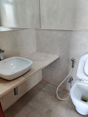 Bathroom in 3 BHK Apartment at Omkar Alta Monte, Malad East – for Rent