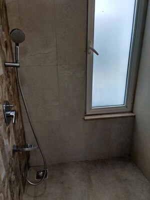 Bathroom in 3 BHK Apartment at Omkar Alta Monte, Malad East – for Rent