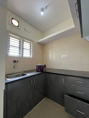 Kitchen in 1.5 BHK Apartment at Indiranagar – for Rent