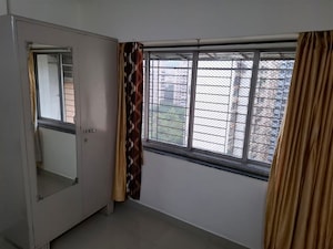 Room in 2 BHK Apartment at Powai Woods CHSL, Powai – for Rent