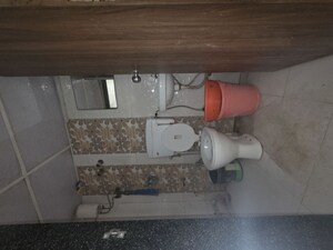 Living Room in Studio Apartment at Royal Palms Garden View, Goregaon East – for Rent