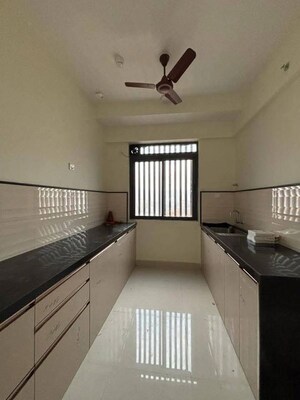Kitchen in 2 BHK Apartment at Dynamix Divum, Malad East – for Sale