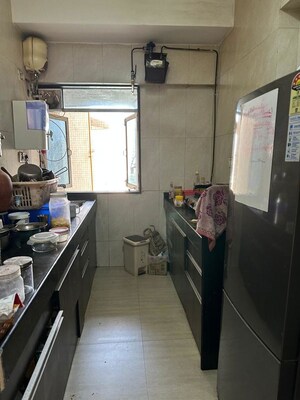 Kitchen in 1 BHK Apartment at Kamanwala Manavstal, Malad West – for Sale