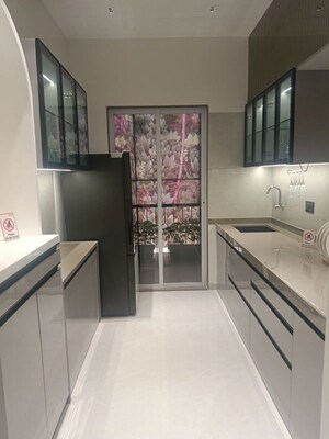 Kitchen in 1 BHK Apartment at Tharwani Vedant Imperial Apartment, Badlapur West – for Sale