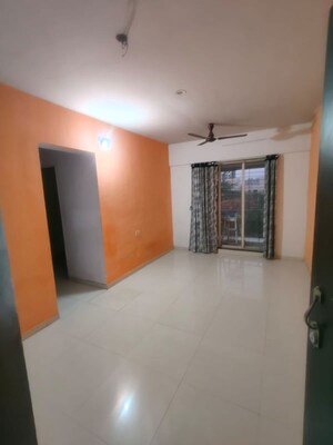 Living Room in 1 BHK Apartment at Cosmos Classique, Ghodbunder Road – for Rent