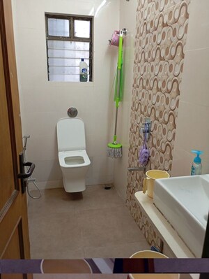 Bathroom in 2 BHK Apartment at Silver Arch Eden woods, Andheri West – for Rent