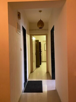 Building Lobby in 1 BHK Apartment at Ajmera Odyessey Apartment, Bhakti Park – for Rent