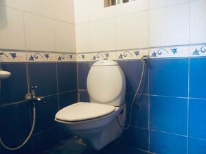 Bathroom in 1 BHK Apartment at Ajmera Odyessey Apartment, Bhakti Park – for Rent