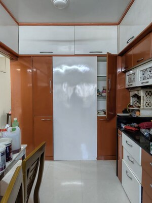 Kitchen in 2 BHK Apartment at Abrol Krishna Utsav, Malad West – for Rent