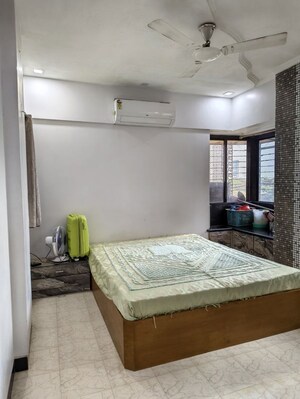 Bedroom in 2 BHK Apartment at Abrol Krishna Utsav, Malad West – for Rent