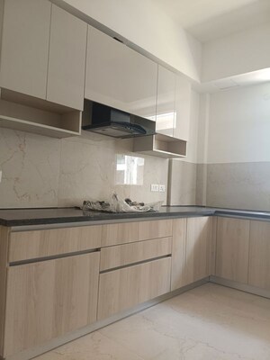 Kitchen in 2.5 BHK Apartment at Smart World Orchard, Sector 61 – for Rent