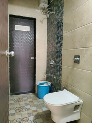 Bathroom in 2 BHK Apartment at Shree Krupa Keshav Heights Phase II, Kalwa – for Sale