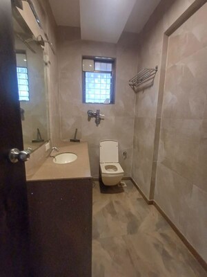 Bathroom in 2 BHK Apartment at Raunak Paradise, Kokanipada – for Sale