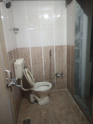 Bathroom in 2 BHK Apartment at Mahavir Plaza, Airoli – for Rent