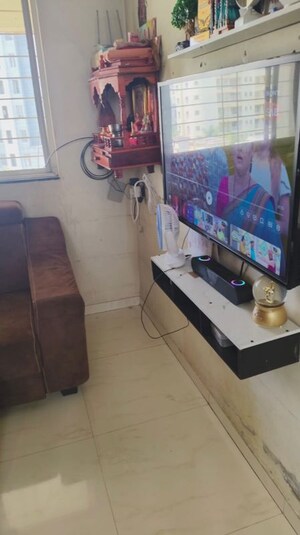Living Room in 1 BHK Apartment at Shree Sai Shraddha CHS, Anand Nagar – for Rent
