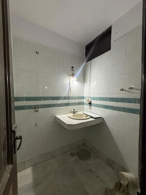 Bathroom in 3 BHK Builder Floor at Kalkaji – for Rent