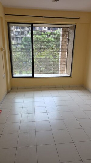 Room in 2 BHK Apartment at Fam CHS, Kopar Khairane – for Rent