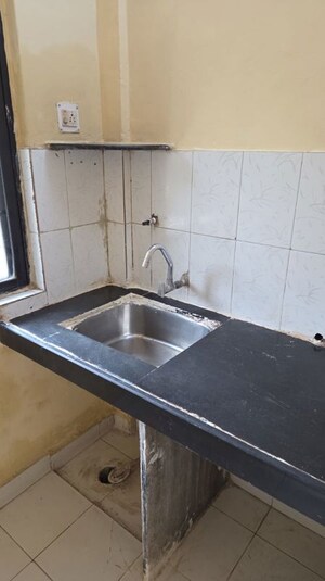Kitchen in 2 BHK Apartment at Fam CHS, Kopar Khairane – for Rent
