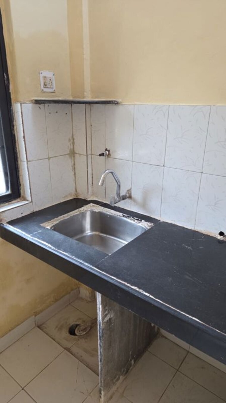 Kitchen, fam-chs 2 Bedroom 917 Sq.Ft. Apartment In Kopar Khairane Navi Mumbai 10384791