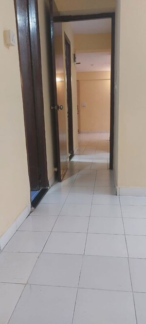 Building Lobby in 2 BHK Apartment at Fam CHS, Kopar Khairane – for Rent