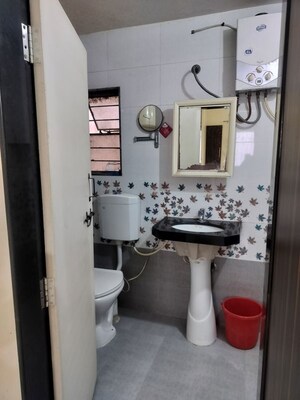 Washroom in 2 BHK Apartment at Deshpande Garden, Narhe – for Rent