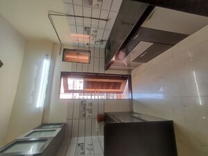 Kitchen in 2 BHK Apartment at Cosmos Jewels, Ghodbunder Road – for Rent