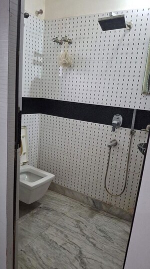 Bathroom in 4 BHK Builder Floor at Dhakuria – for Sale