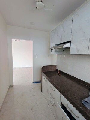 Kitchen in 4 BHK Apartment at Bansi Villa, Vile Parle West – for Rent