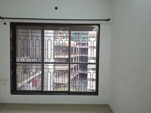 Room in 1 RK Apartment at Tirupathi The Windsor, Kandivali East – for Rent