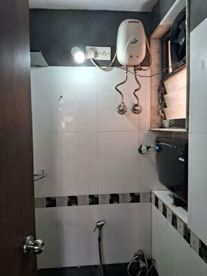Bathroom in 1 RK Apartment at Orchid Complex Gundecha, Kandivali East – for Sale