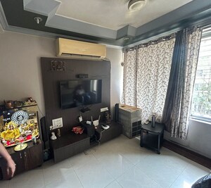 Living Room in 1 BHK Apartment at SD Siennaa Wing C, Kandivali East – for Rent