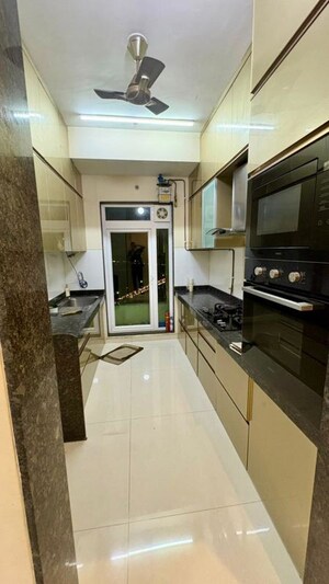 Kitchen in 2 BHK Apartment at Rustomjee Athena, Majiwada – for Rent