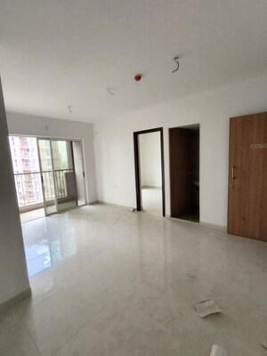 Living Room in 2 BHK Apartment at Lodha Codename Premier, Dombivli East – for Rent