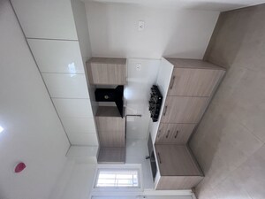 Bathroom in  Apartment at Bhartiya Nikoo Homes Phase 2, Thanisandra Main Road – for Rent