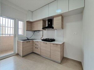 Kitchen in  Apartment at Bhartiya Nikoo Homes Phase 2, Thanisandra Main Road – for Rent