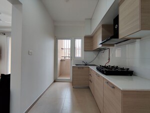 Kitchen in  Apartment at Bhartiya Nikoo Homes Phase 2, Thanisandra Main Road – for Rent
