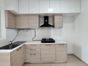 Kitchen in  Apartment at Bhartiya Nikoo Homes Phase 2, Thanisandra Main Road – for Rent