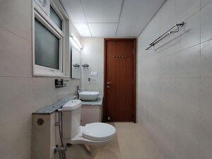 Bathroom in  Apartment at Bhartiya Nikoo Homes Phase 2, Thanisandra Main Road – for Rent