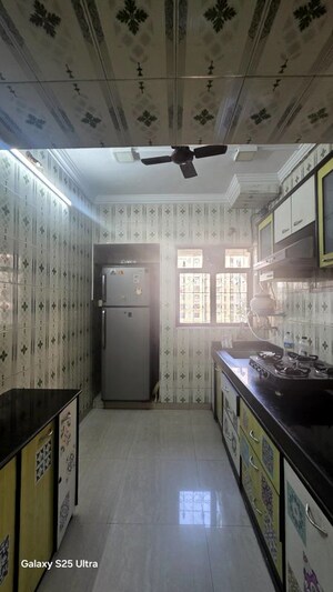 Kitchen in 2 BHK Apartment at Gala Pride Park, Manpada – for Rent