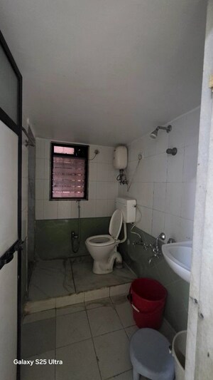 Bathroom in 2 BHK Apartment at Gala Pride Park, Manpada – for Rent