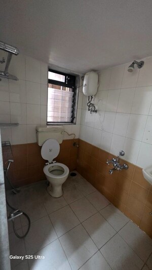 Bathroom in 2 BHK Apartment at Gala Pride Park, Manpada – for Rent