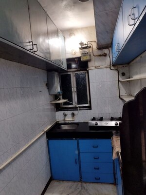 Kitchen in 1.5 BHK Apartment at Vile Parle West – for Rent